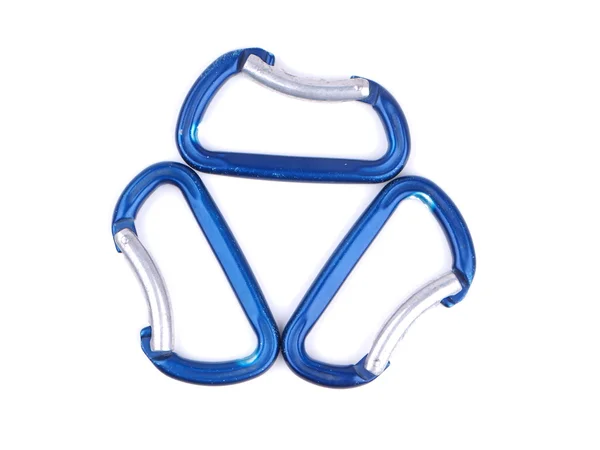 Blue climbing carabiners on a white background — Stock Photo, Image