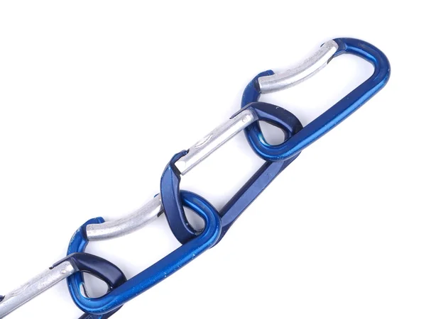 Blauw karabiners klimmen op een witte achtergrond — Stockfoto