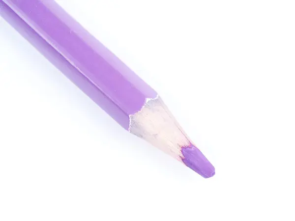 Lápiz púrpura sobre fondo blanco —  Fotos de Stock