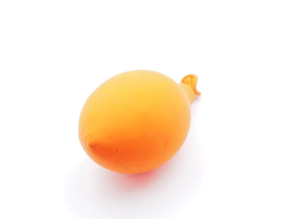 Fehér alapon narancs léggömb — Stock Fotó