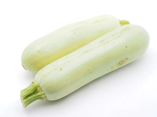 Grön zucchini på vit bakgrund — Stockfoto