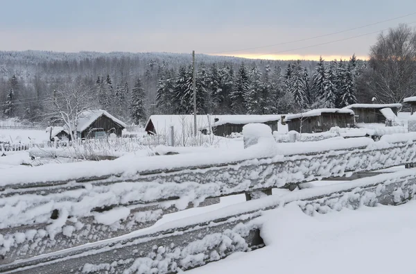 Russische dorp in de winter — Stockfoto