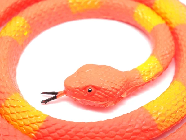 白色背景的橙色玩具蛇 — 图库照片