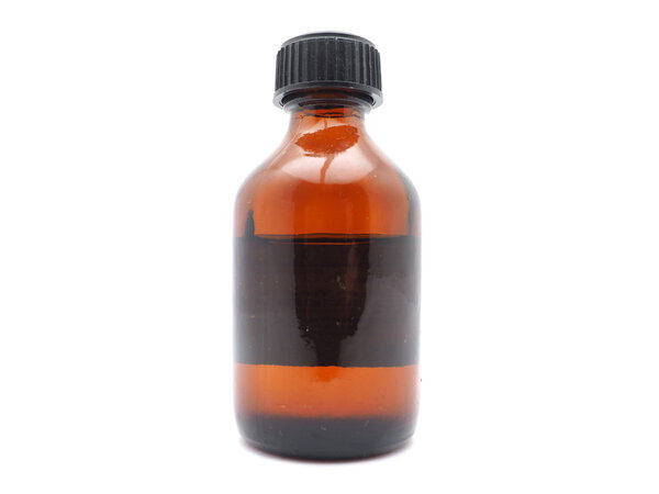 Medicine bottle of brown glass isolated on white background