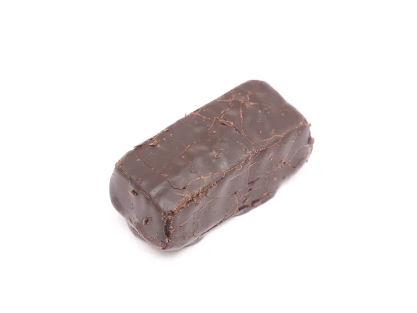 Caramelo de chocolate sobre un fondo blanco — Foto de Stock