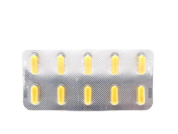 Verpakken van tabletten op een witte achtergrond — Stockfoto