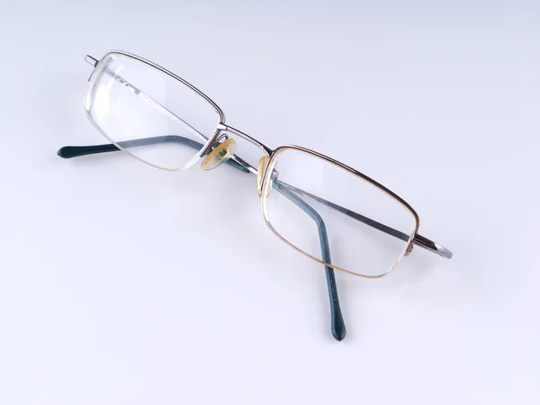 Eye glasses on a gray background — Stock Photo, Image