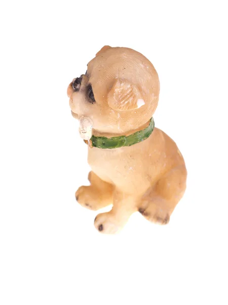Figura de perro sobre un fondo blanco — Foto de Stock