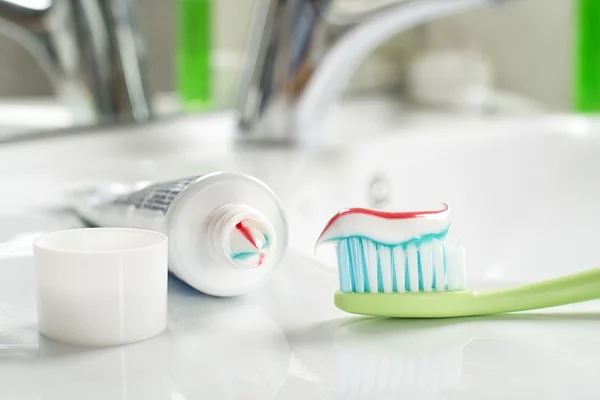 Toothbrush in bathroom — Stock Photo, Image