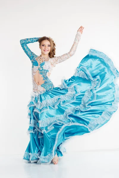 Dancing teen girl in fashion oriental dress — Stock Photo, Image