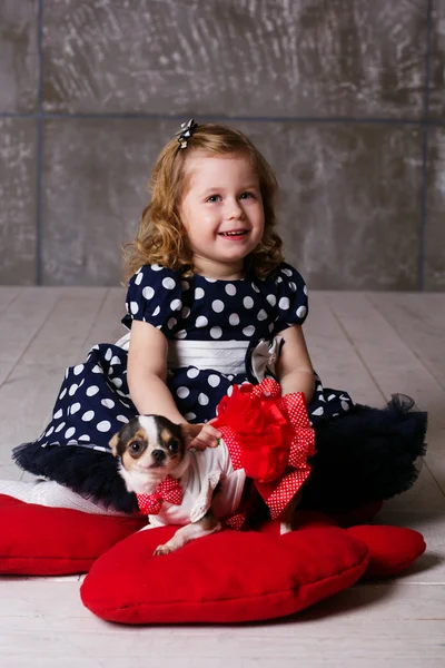 Happy friends child girl and dog at home — Stock Photo, Image