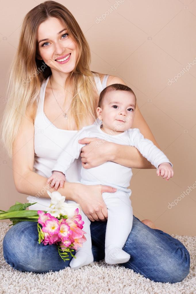 Young Mom Holding Her Baby Boy Stock Photo C Chupacabra 106486536