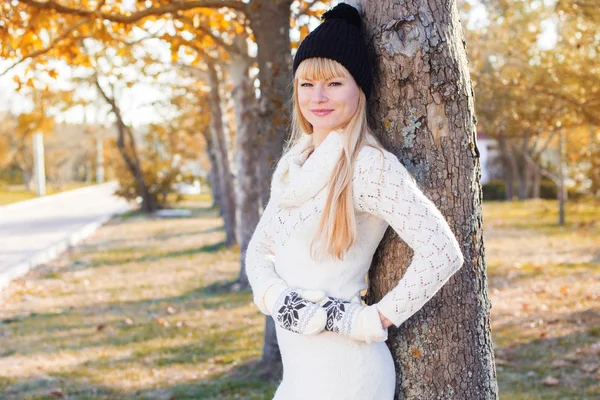 Attractive blonde girl with wearing warm clothes — Stock Photo, Image