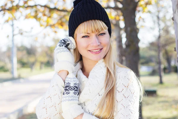 Attractive blonde girl with wearing warm clothes — Stock Photo, Image