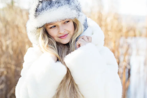 Cute little girl in winter clothes outdoors — Stock Photo, Image