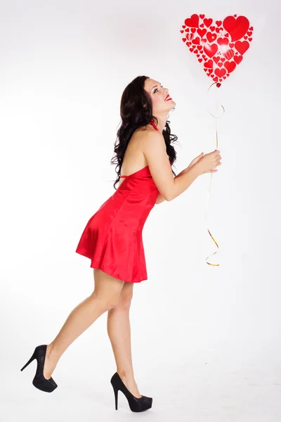 Sexy brunette met ballonnen hart — Stockfoto