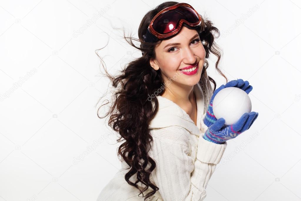 Woman with ski goggles isolated on white
