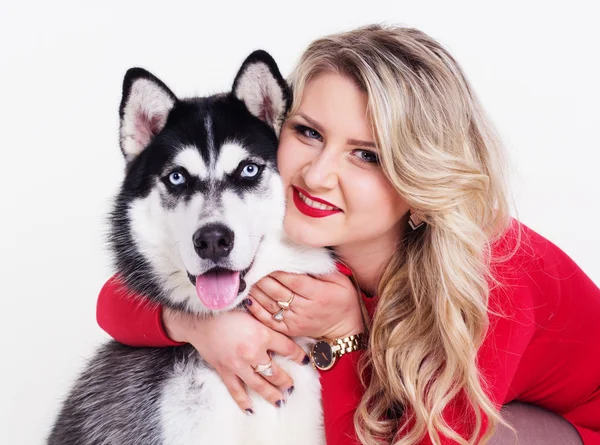 Young girl with her husky dog isolated on white — Stock Photo, Image