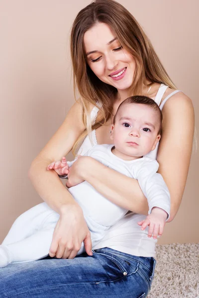 Happy young mother with her little son — Stock Photo, Image