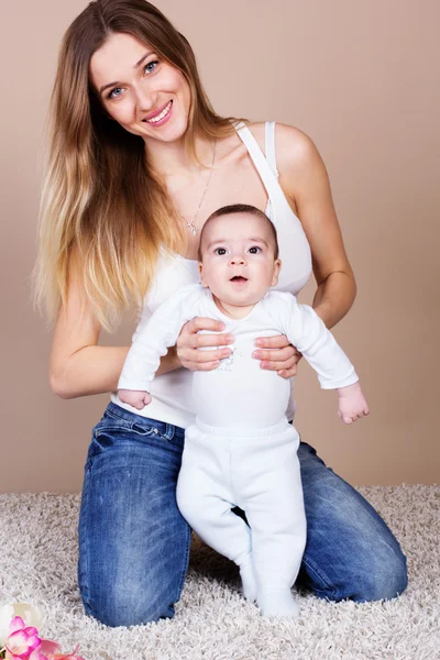 Happy young mother with her little son — Stock Photo, Image
