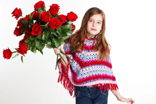 Little girl holding a bouquet of red roses — Stock Photo, Image