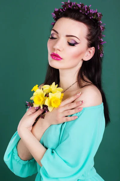 Fashion portrait of girl with purple flowers wreath in hair — Stock Photo, Image