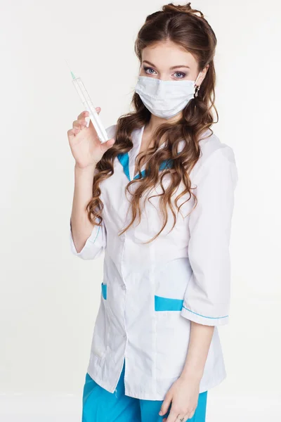 Nurse with syringe on white background — Stock Photo, Image