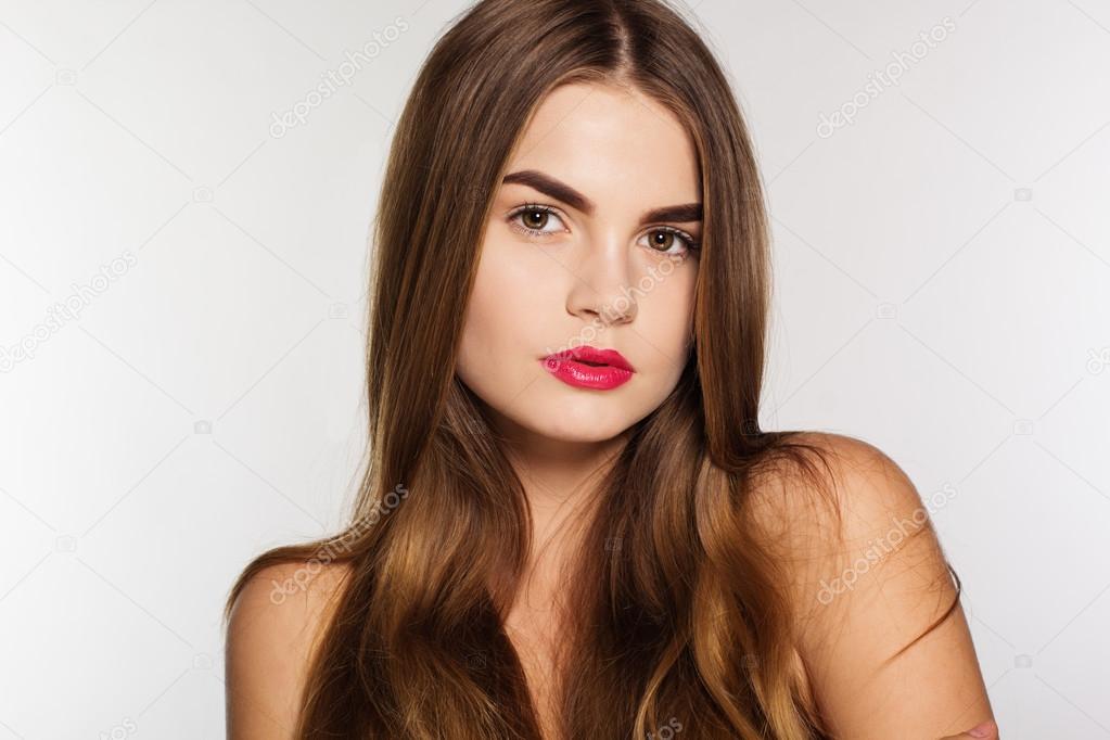 Woman with perfect skin and shiny hair