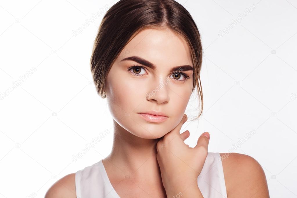 Face of girl with smooth skin tone