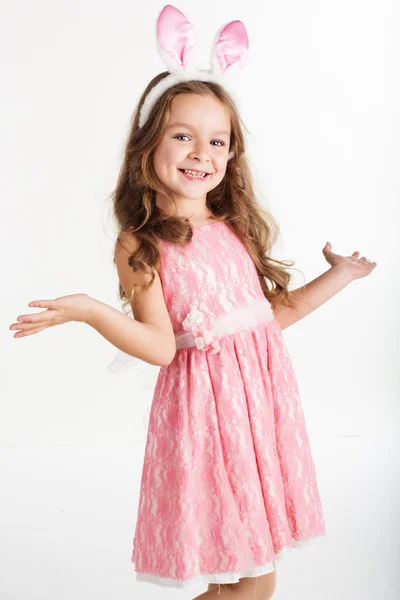 Happy child girl is wearing bunny ears, christmas costume — Stock Photo, Image