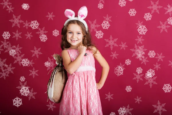 Child girl with pink is wearing bunny ears — Stock Photo, Image