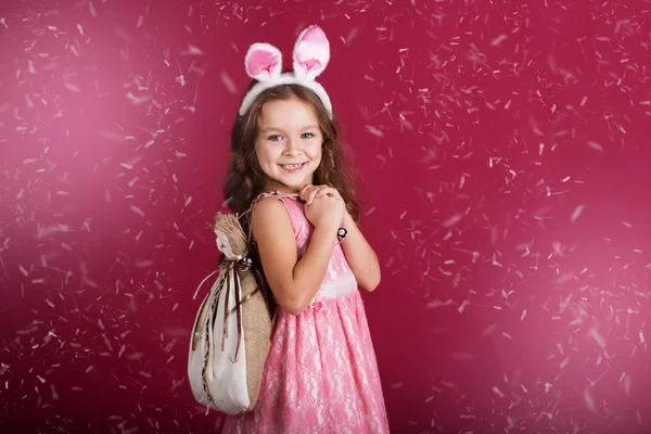Child girl is wearing pink ears — Stock Photo, Image
