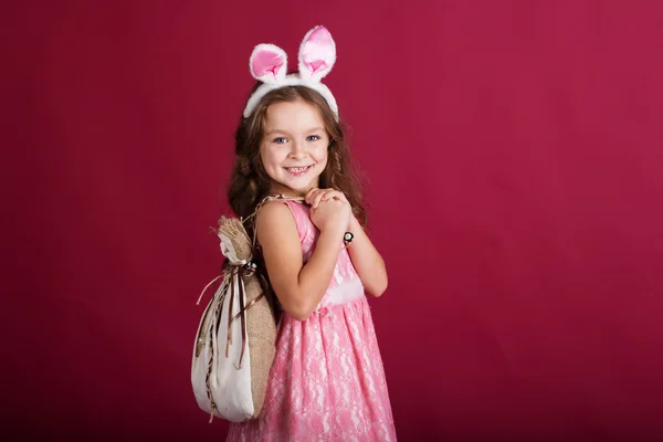 Child girl is wearing rabbit ears, christmas time — Stock Photo, Image