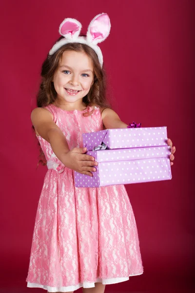 Bunny girl with gift boxes — Stock Photo, Image