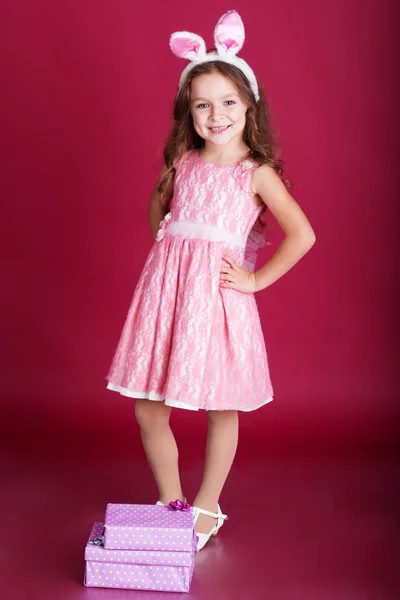 Happy child is wearing pink dress — Stock Photo, Image