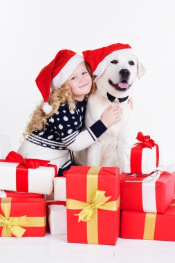Child girl with dog, christmas concept