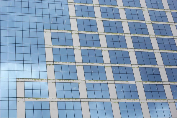 Blue background from office glass windows