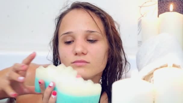 Beautiful Young Sexy Brunette Woman Taking A Relaxing Bath Enjoying With Foam Using Bath Sponge