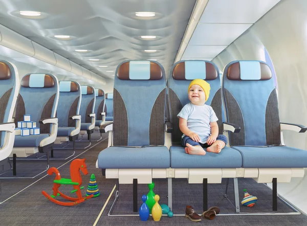 Child in the airplane — Stock Photo, Image