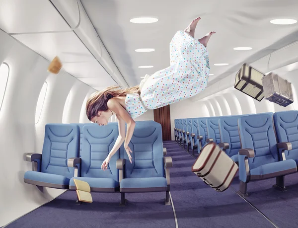 The girl in an airplane — Stock Photo, Image