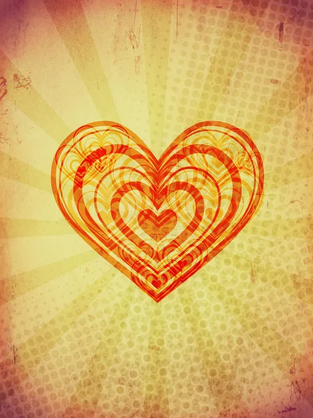 Red concentric hearts with rays on old paper — Stock Photo, Image