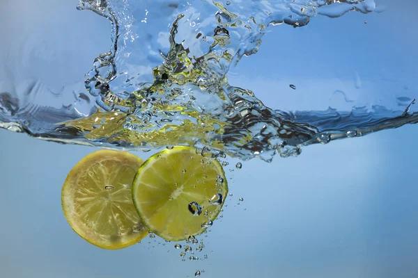 Fresh lemon and lime water splash Stock Picture