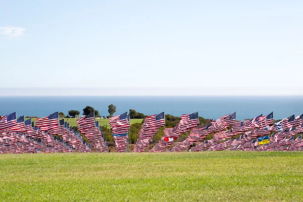 Viele griechische Flaggen wehen im Wind — Stockfoto © Regisser_com