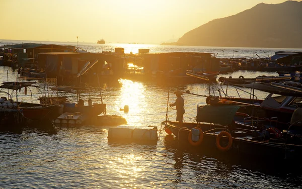 Puesta de sol en hong kong pueblo de pescadores —  Fotos de Stock