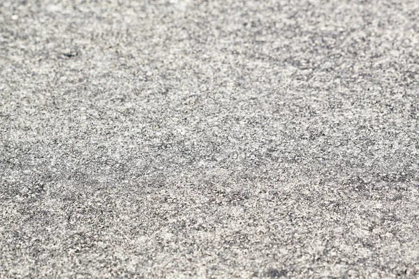 暗いアスファルトで舗装された表面の背景 — ストック写真