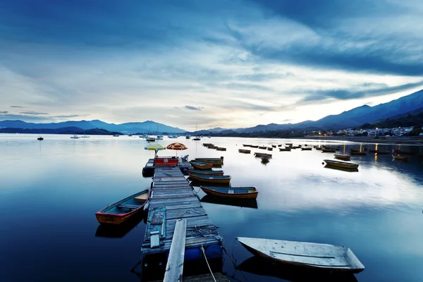 Boat pier at sunset — Stock Photo, Image