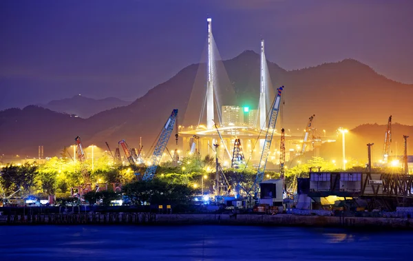 Container Cargo freight ship with working crane bridge — Stock Photo, Image