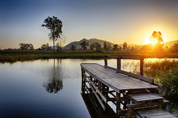 Serene Sunrise over fishing Jetty — Stock Photo, Image