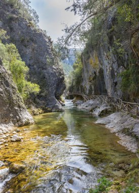 River Borosa Walking Trail in the Sierra Cazorla Mountain Range clipart