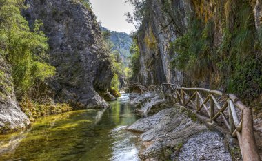 River Borosa Walking Trail in the Sierra Cazorla Mountain Range clipart